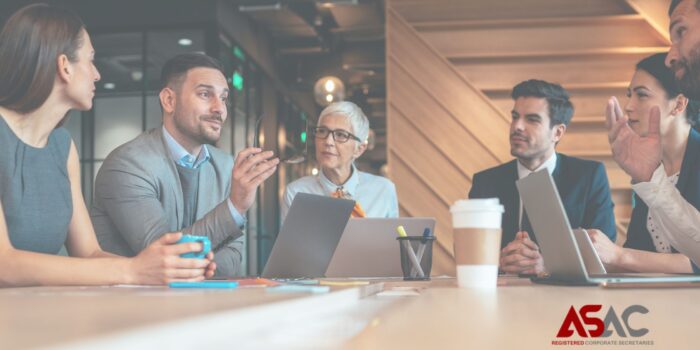 Collaborative Business Solutions for Startups and Established Companies Business professionals collaborating in an office environment, symbolizing expertise in company registration, formation, and business setup services by Ananda Sirisena and Co.
